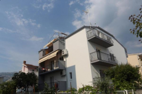 Отель Apartments with a parking space Podstrana, Split - 11363  Подстрана